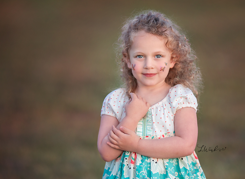 curly haired young girl portrait