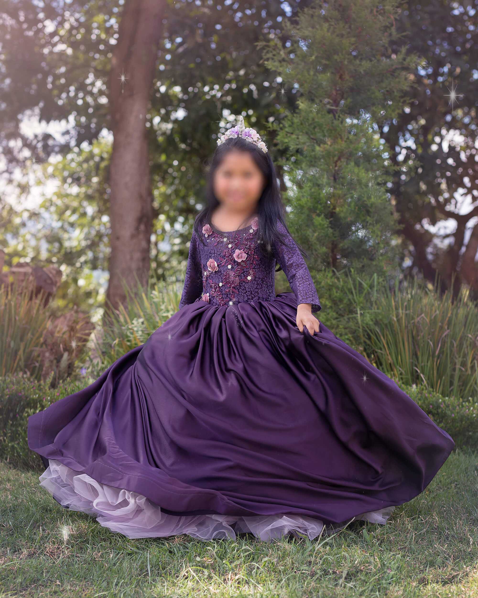 girl twirling in purple dress