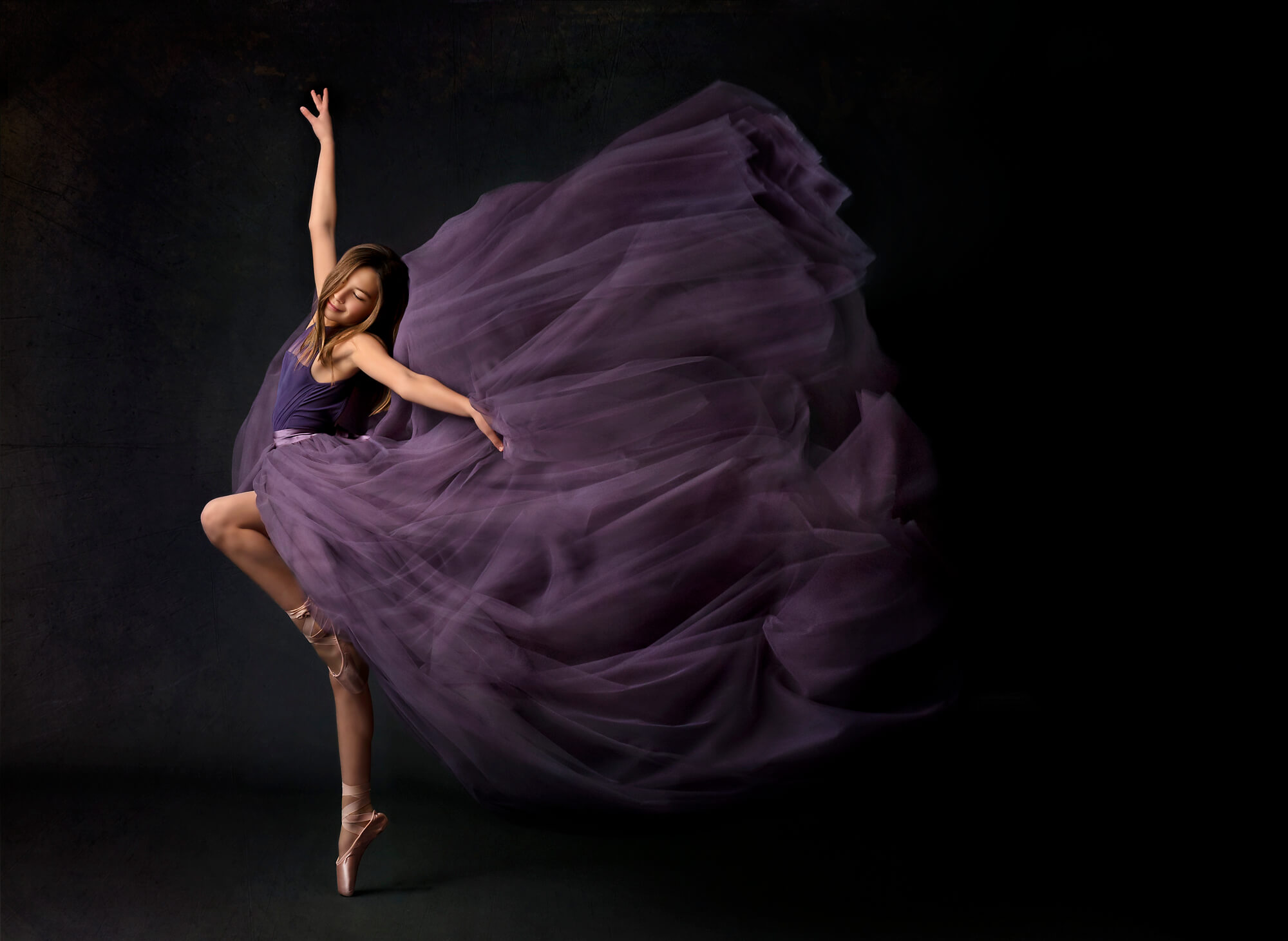 ballet dancer en point in purple dress at Redondo Beach studio